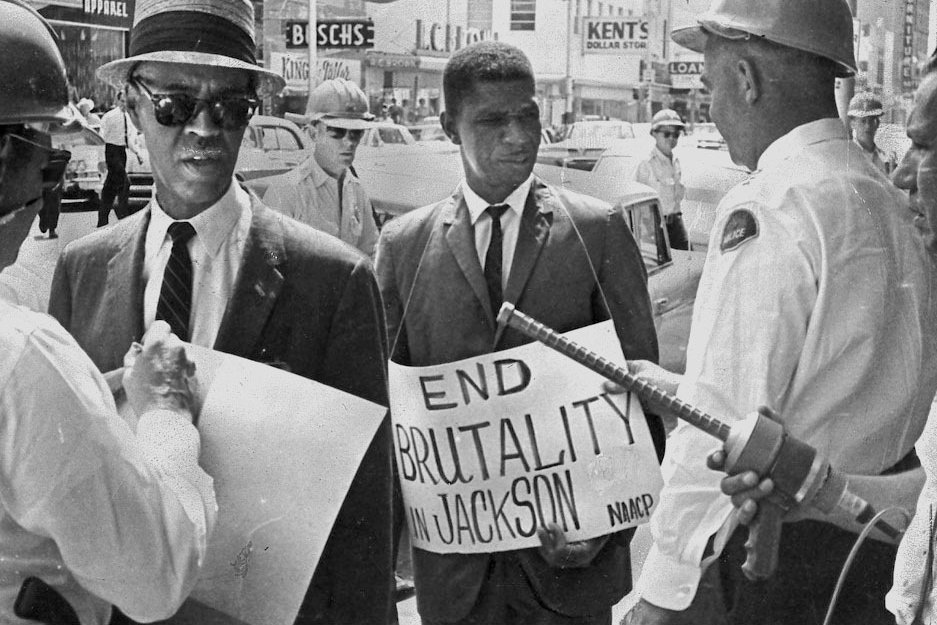 1963 NAACP leaders Roy Wilkins and Medgar Evers picketing
